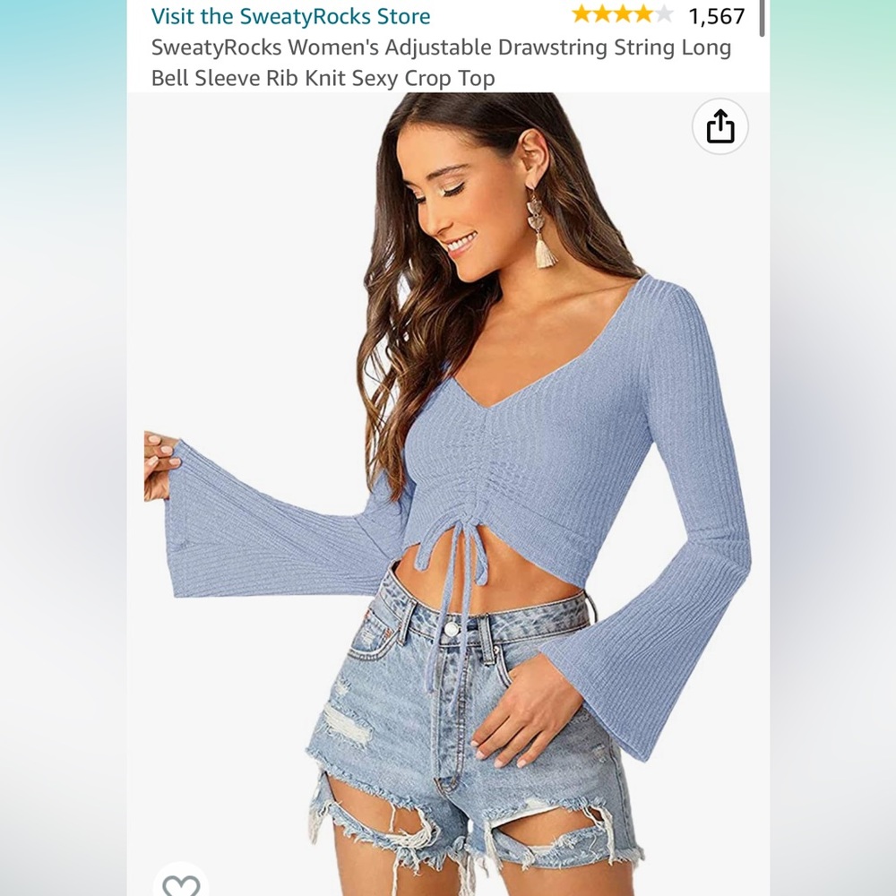 Light blue long sleeve drawstring top. NEW